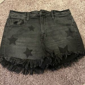 Black star denim shorts